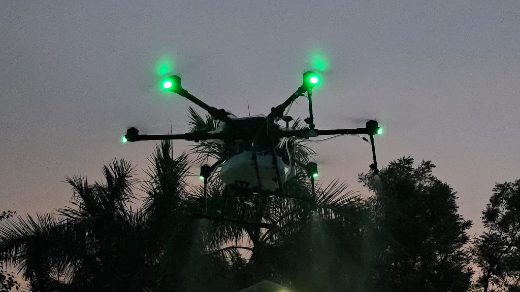 Agricultural spraying drone close-up on the grass