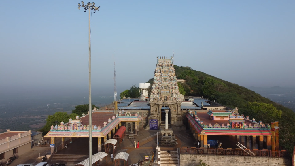Aerial survey overview of hilltop temple complex and surrounding landscape